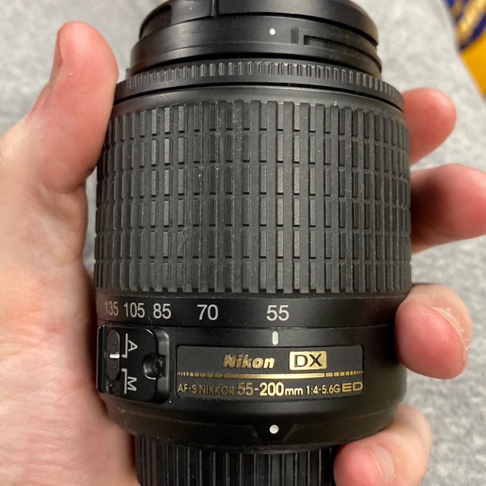 Lightly used camera attachment  Nikon DX af-s Nikki’s 55-200mm 1:4 5.6g ED